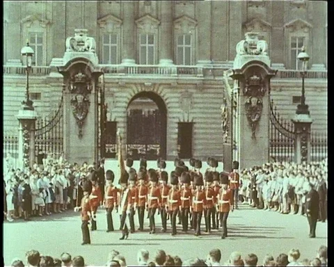 Soldiers marching in front of palace while people are watching them, 1965 Stock Footage 132327920