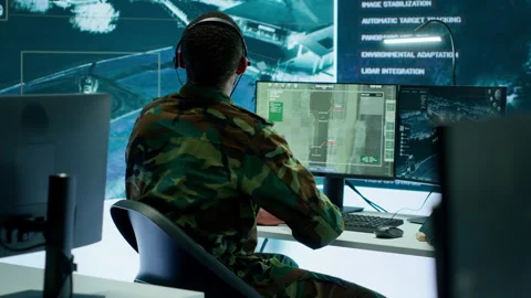 Soldiers in a modern command center analyze live data from cctv radar sources Stock Footage 280149706