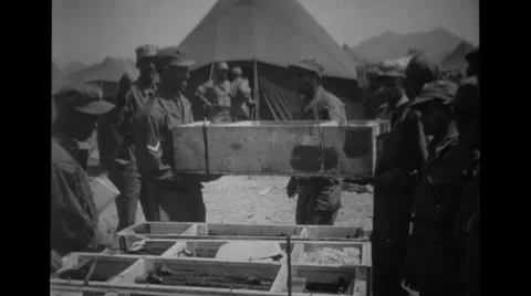 Soldiers moving boxes Stock Footage 36303634