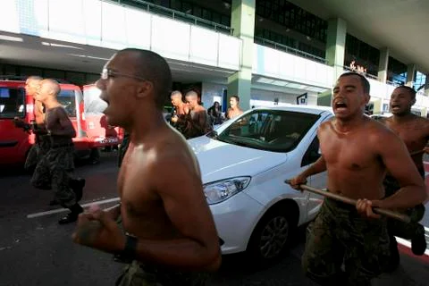 Soldiers practicing physical activity Stock Photos