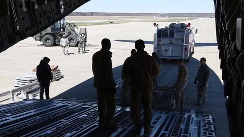 Soldiers prepare to load fire engine in Boeing C-17 Globemaster III - 2018 Stock Footage 94409305