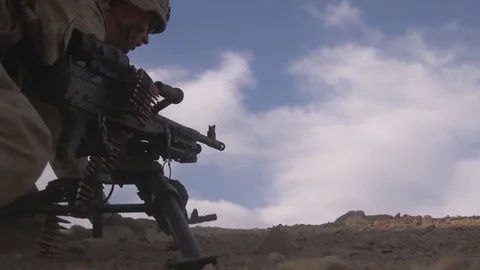 Soldiers prepare position and machine gun for firing Stock Footage 120833831
