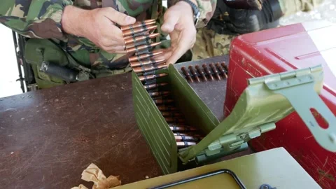 Soldiers preparing war bullets loaded Video stock 144057338