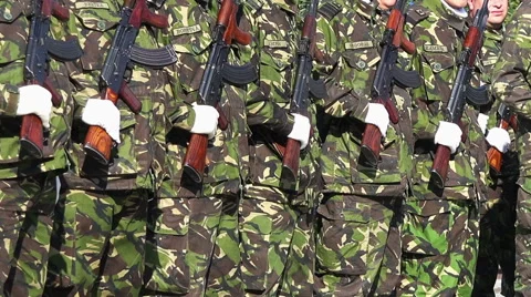 Soldiers presenting weapons Stock Footage 41864467