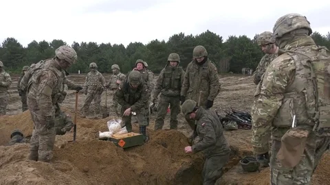 Soldiers setting explosives in hole during exercise in Poland 스톡 동영상 82862820