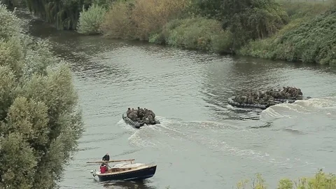 Soldiers speedboat Stock Footage