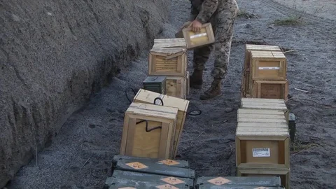 Soldiers stacking crates of ammunition during exercise Balikatan Stock Footage 106004518