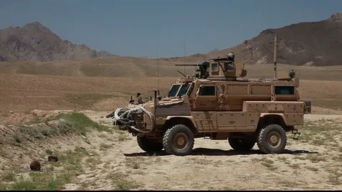 Soldiers test fire weapons from Mine Resistant Ambush Protected vehicles - 2009 스톡 동영상 85035564