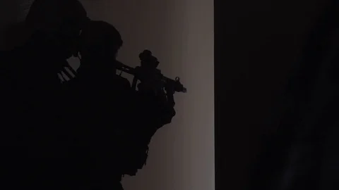 Soldiers train inside of a building with assault rifles Stock Footage 114083514