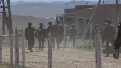 Soldiers train running to a wounded partner Stock Footage 109354189