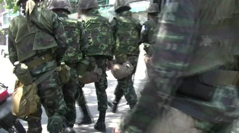 SOLDIERS TROOPS MARCH FORWARD During Protest Demontration to Stop Rioters Stock Footage