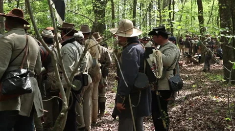 Soldiers wait in woods for orders Stock Footage 39980711