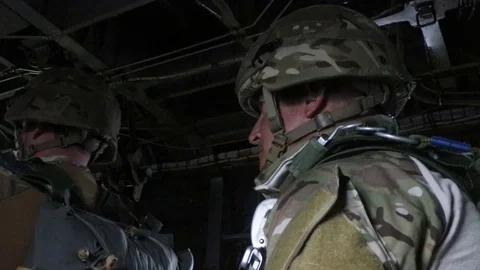 Soldiers waiting to perform static line parachute jump Stock Footage 90120722