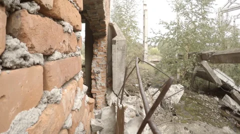 Soldiers with weapon coming out of destroyed building Stock Footage 68449366
