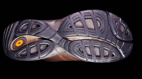 The sole of the shoe comes on a transparent surface and leaves a trail 動画素材 56802758