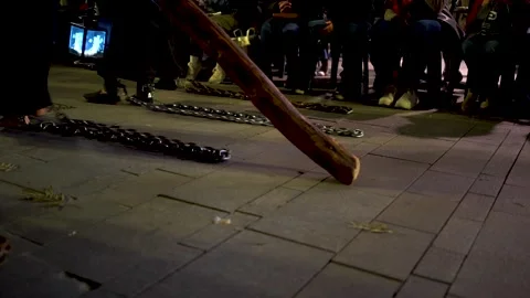 Solemn Easter Procession in Gandia: Emotional Ritual with Chains and Devotion Stock-Footage 295006578