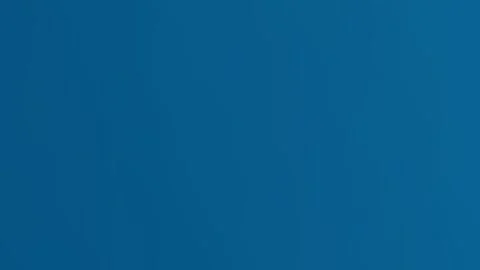 A solid and uniform background featuring a vibrant shade of deep sky blue Stock Footage 335145908