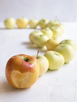 Solid background of green apples in a crate. Many organic Granny Smith apples Stock Photos
