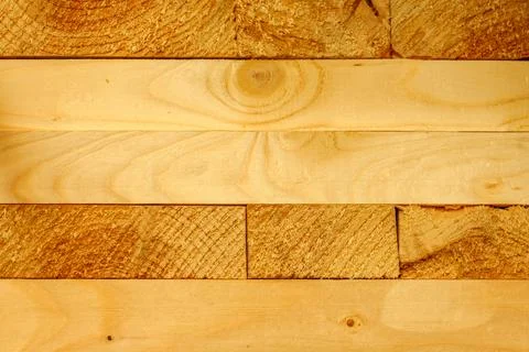 Solid background of new wooden bars. Yellow wood. Foto stock