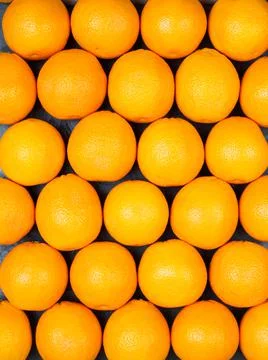 Solid background of whole fruit oranges Stock Photos
