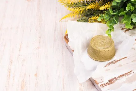 Solid bars of organic shampoo, conditioner and body cream Foto stock