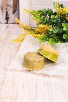 Solid bars of organic shampoo, conditioner and body cream Stock Photos