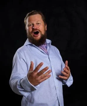Solid bearded man in shirt singing opera Stock Photos