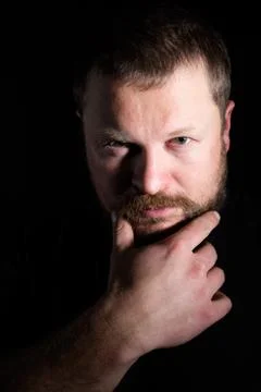 Solid bearded middle-aged man portrait Stock Photos