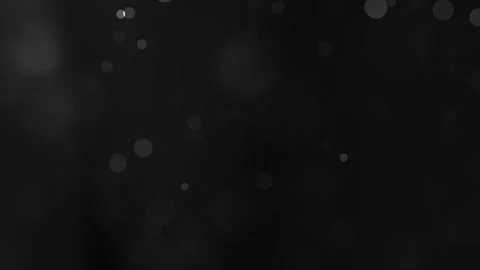Solid black background with bokeh light overlay Stock Footage 329735490