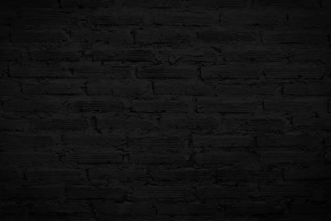 Solid black brick wall background texture. Foto stock