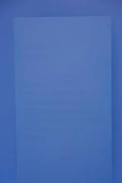 A Solid Blue Background featuring a Subtle Texture ideal for Creative Projects 库存照片