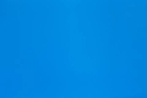 Solid blue paper background with light texture Foto stock