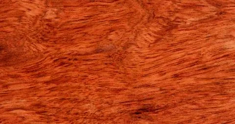 Solid Brazilian cherry wood texture background in filled frame format Foto stock