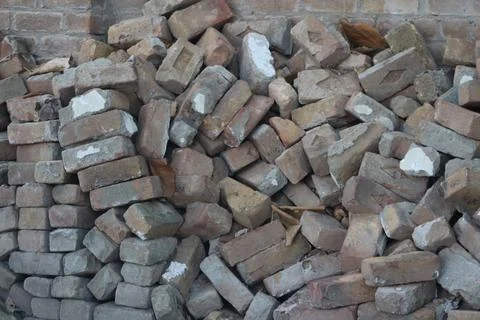 Solid bricks used for construction, Old red brick isolated background (bricks). Stock Photos