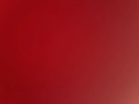 Solid bright red minimalist background with subtle gradient lighting for graphic Stock Illustration