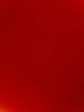 Solid bright red minimalist background with subtle gradient lighting for graphic Fotos de archivo