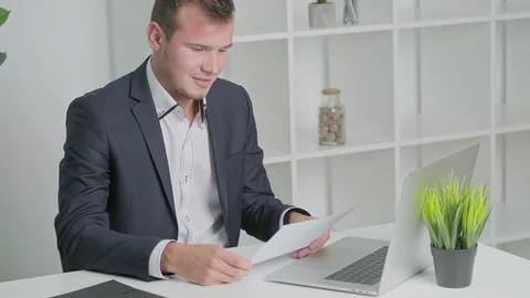 Solid businessman in a jacket works in office of the company. Stock Footage 127485827