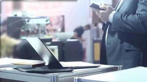 Solid businessman using a smartphone in modern business office Stock Footage 73425881