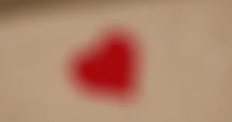 Solid cardboard for packaging goods and products with red plastic hearts glued Stock Footage 327050800