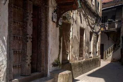 Solid carved door in Stone town Stock Photos