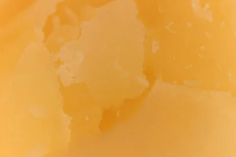Solid Cheese macro closeup. Background Texture. Stock Photos