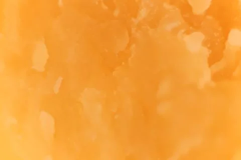 Solid Cheese macro closeup. Background Texture. Foto stock