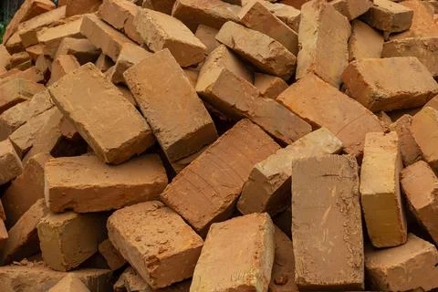 Solid clay brick used for construction. Background, brown red color 写真素材