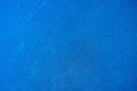Solid color background. An empty, matte blue surface. Abstract blank for desi Stock Photos