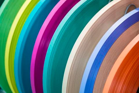 Solid color or wood grain PVC edge banding tape. ABS edge banding. Set of col Stock Photos