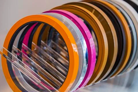 Solid color or wood grain PVC edge banding tape. ABS edge banding. Set of col Stock Photos