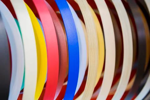 Solid color or wood grain PVC edge banding tape. ABS edge banding. Set of col Stock Photos