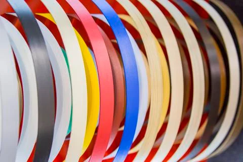 Solid color or wood grain PVC edge banding tape. ABS edge banding. Set of col Stock Photos
