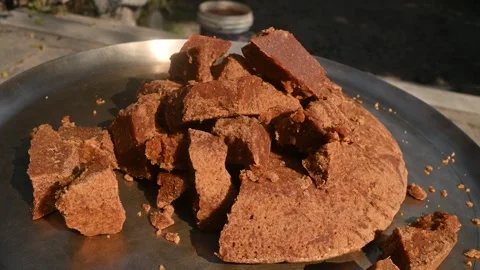 Solid Cubes of Natural Date Palm Jaggery - Nalen Gur Stock Footage 302637994