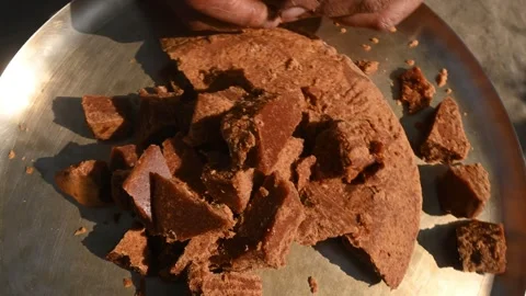 Solid Cubes of Natural Date Palm Jaggery - Nalen Gur Stock Footage 302638019